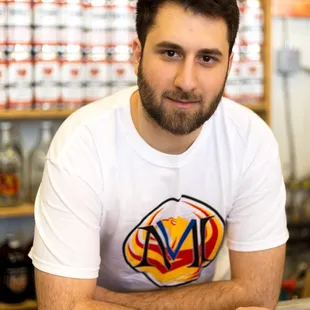 a man sitting at a counter