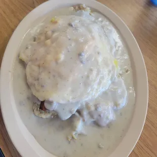 That's a stacked Hillbilly breakfast, eggs, bacon, sausage, hash browns ,biscuits,,its got it all ,,just no seasoning!