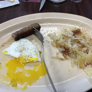 1 egg, hash browns, choice of either bacon, 2 sausage links, or 1 sausage patty and choice of biscuit and gravy or toast $5.25