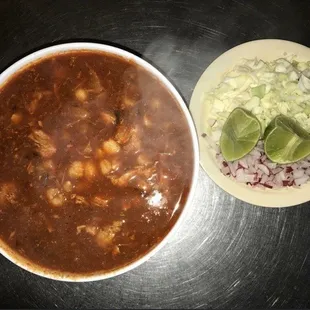a bowl of chili and a bowl of coleslaw