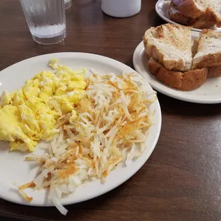 Scrambled eggs, hash browns &amp; 2 slabs of homemade wheat toast!!