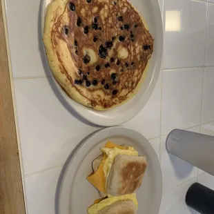 Blueberry pancake and egg and cheese biscuits.