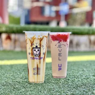 two cups of coffee on a green lawn