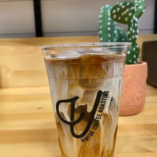 Iced Hazelnut Americano with half n half.