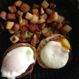 Carry out Eggs Benedict with home fries.