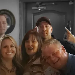 a group of people posing for a picture