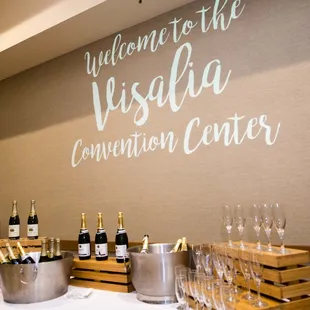 a display of wine bottles and glasses