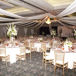 tables and chairs set for a formal event
