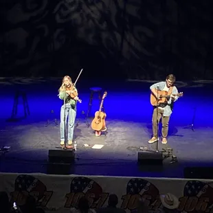 three musicians on stage