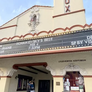 two people standing outside