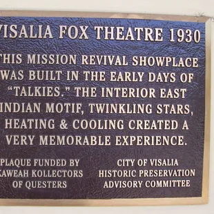 a plaque on the wall