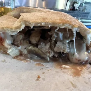 Inside a sausage mushroom calzone