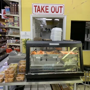 take out counter with donuts and pastries