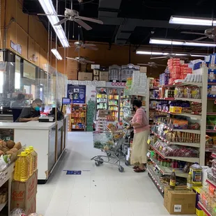 a woman shopping in a grocery store