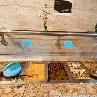 a buffet with a variety of food items