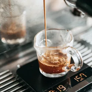 offee being poured into a cup