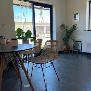 a table and chairs in a coffee shop