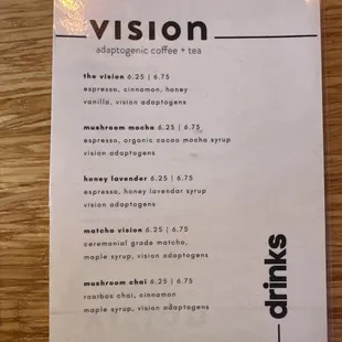 a menu on a wooden table