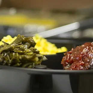 Beef meatloaf w/ signature glaze, greens, and rice pilaf