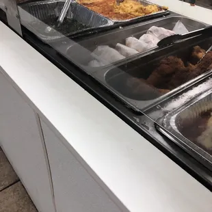 a buffet with a variety of food items