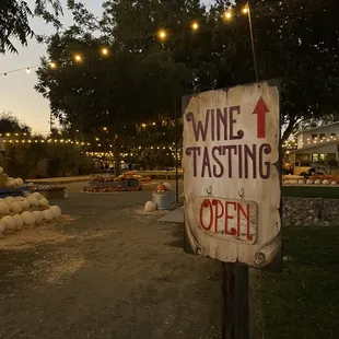 a wine tasting open sign