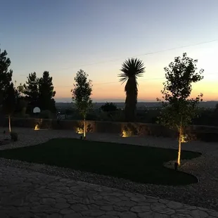 a patio with a table and chairs