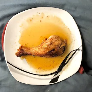 Sampling the merchandise (roasted pollo) at home. [quality control]