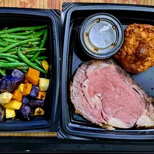 Prime rib, roasted vegetables, and bread/roll