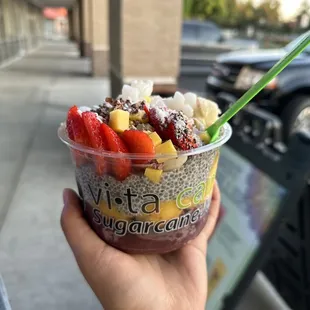 Açaí bowl- chia pudding, mango and açaí base with a bunch of different toppings and fresh fruit.