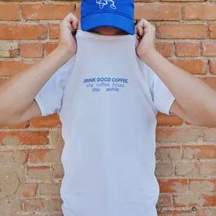 a man wearing a blue hat