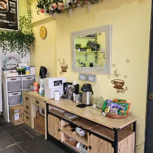 a coffee bar with a coffee maker