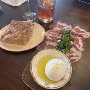 Kir royale, boulevardier, focaccia, burrata, and cured meat