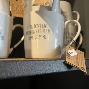 coffee mugs on a shelf