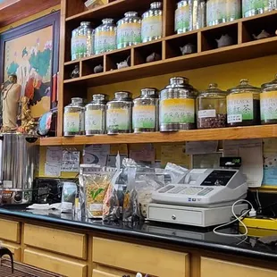 a man standing in a tea shop