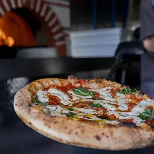 a pizza being cooked