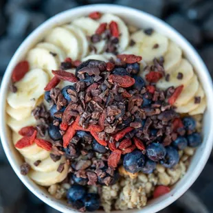 a bowl of fruit and nuts