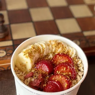 a bowl of fruit and oatmeal