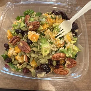 Pumpkin seeds, quinoa, walnuts, raisins, onions, squash, avocado and kale!
