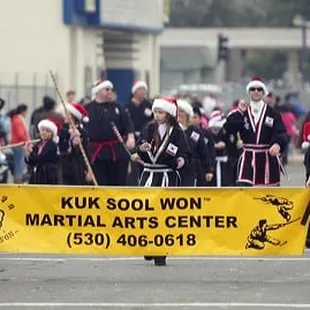 Showing our team spirit during the Woodland Holiday Parade