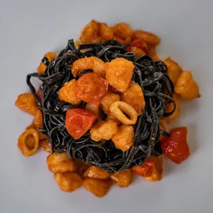 Squid Ink Taglioline with Calamari, Shrimps and Cherry Tomatoes