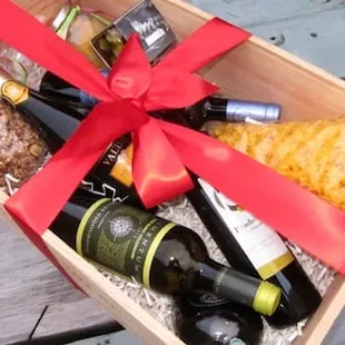 Vita&apos;s gift boxes, a wooden wine crate filled with all sorts of Lopez goodies, a perfect hostess gift.