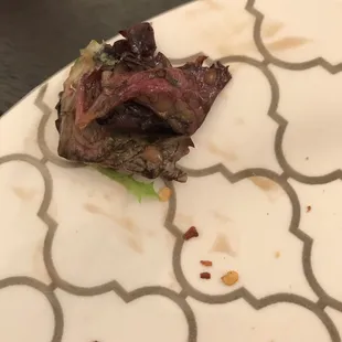 Rotting lettuce at bottom of salad.