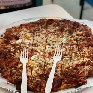 Worth all the hype. Cheese pizza with fried pepperoni, sausage, egg, and extra cheese.