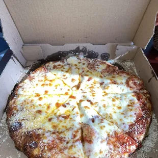 What a medium one topping pizza with garlic parm crust looks like at Vito&apos;s pizzeria on ecorse rd in taylor michigan