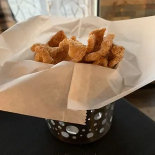 Complimentary Fried pig skin..... instead of bread.