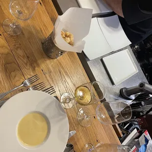 Course one: Summer squash bisque, cherry wood smoked. Fresh pork rinds. Lancer (Portuguese white wine)