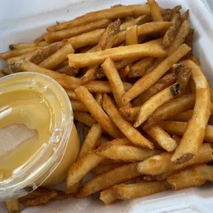 Perfectly crispy, nicely seasoned fries... get it with cheese!