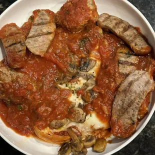 Lasagna added mushrooms, meatballs and sausage yummy