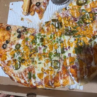 Half chicken tikka and half cheese with olives