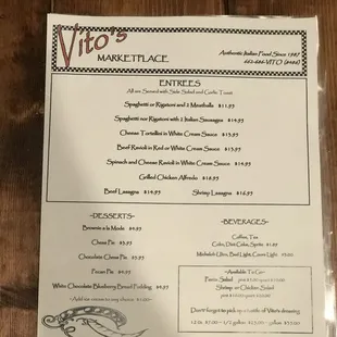 a menu on a wooden table